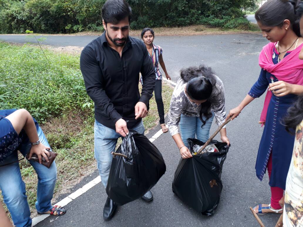 Students cleaning campus